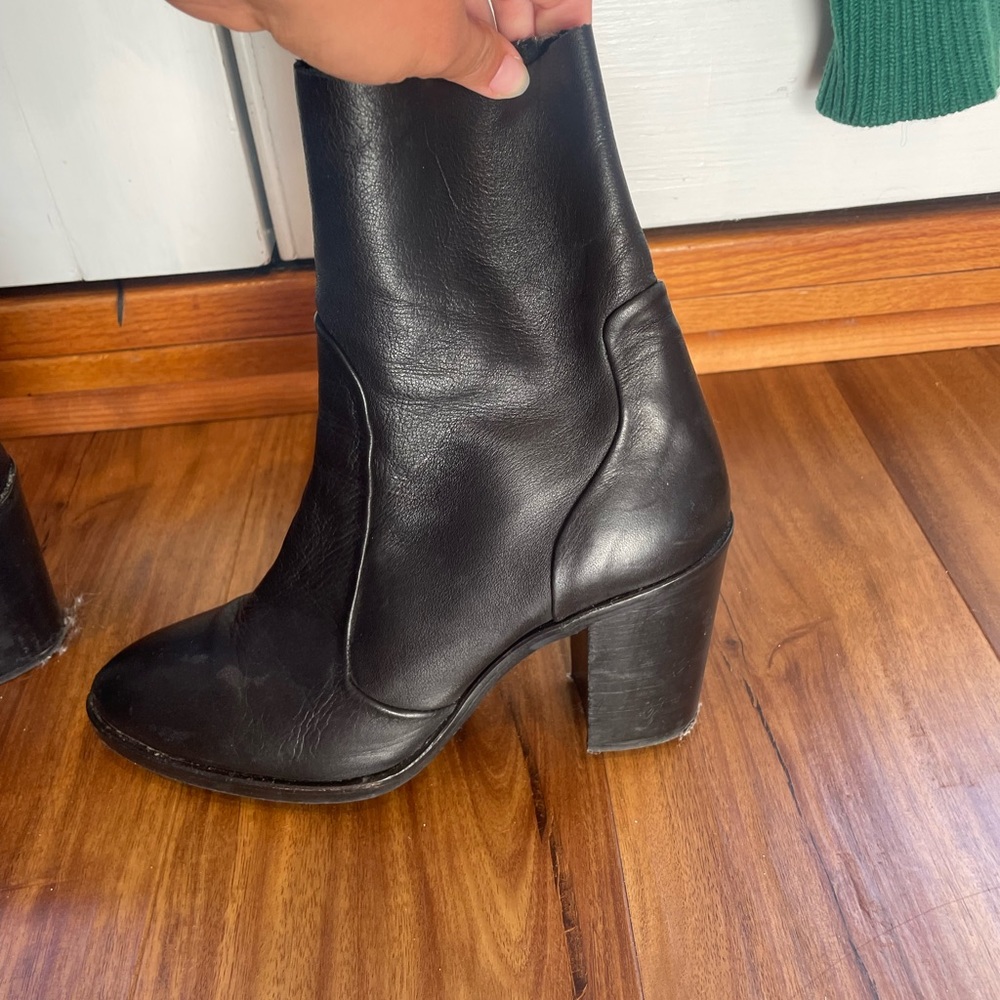 Black leather boots.